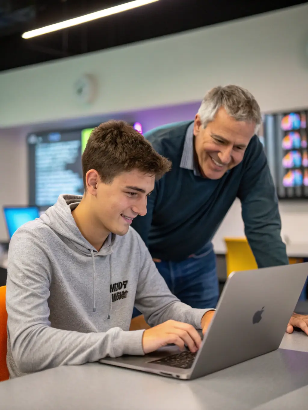 An experienced Indian tech professional mentoring a student, highlighting the mentorship aspect of the Full-Stack Development Course at WebAcademy.